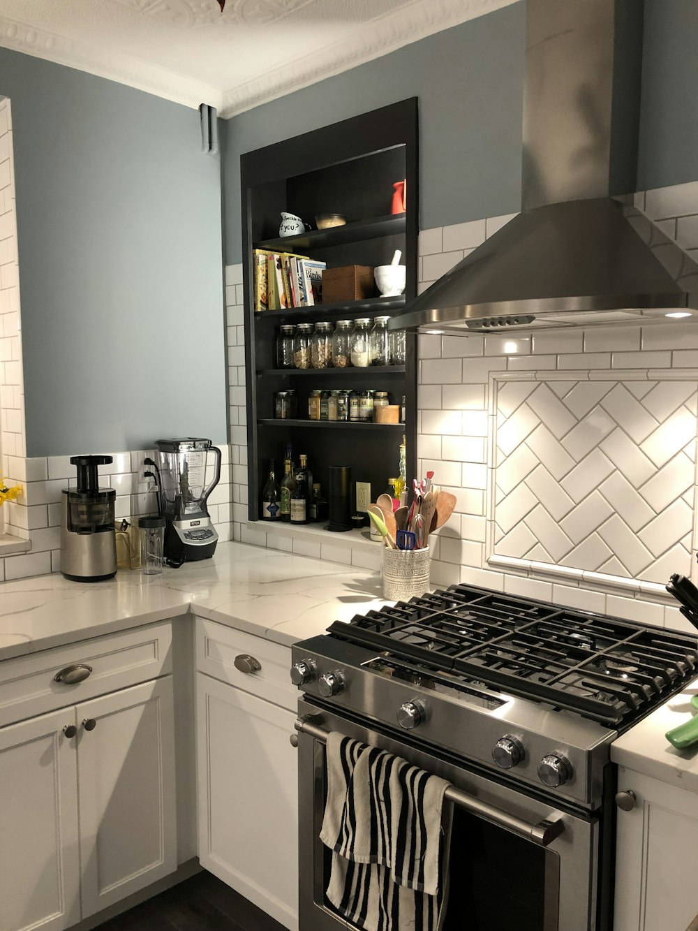 black and silver coffee maker beside black and silver coffee maker