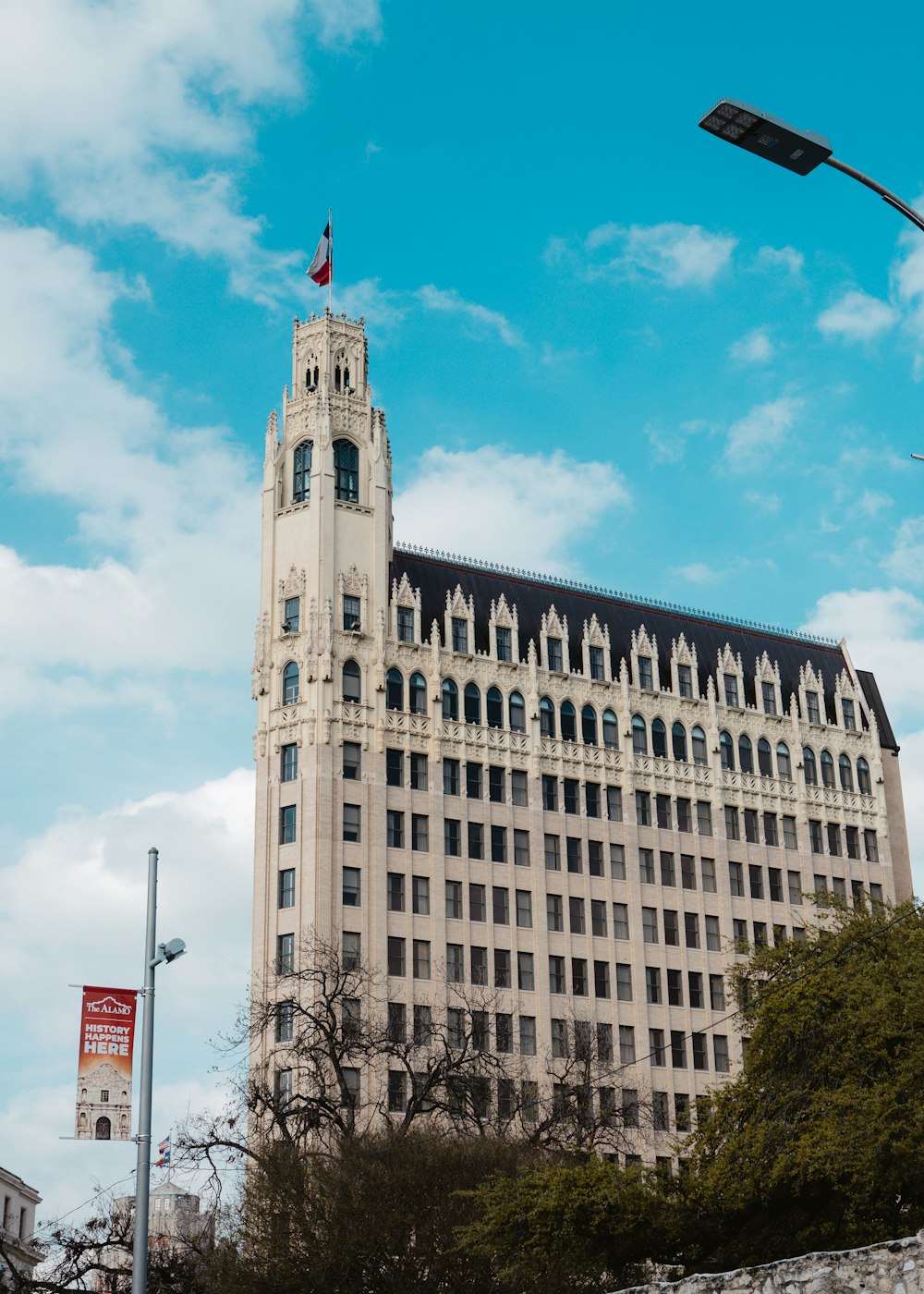 white concrete building under blue sky during daytime