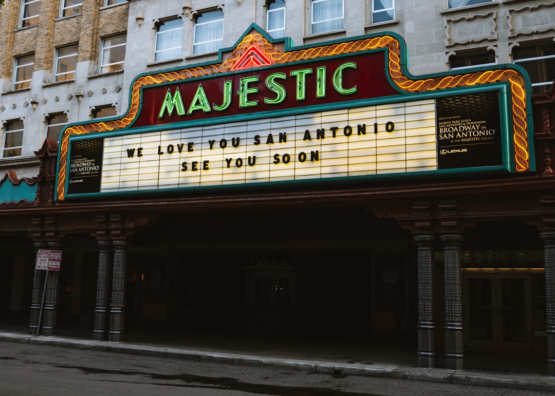 a theater marquee for majestic in front of a building