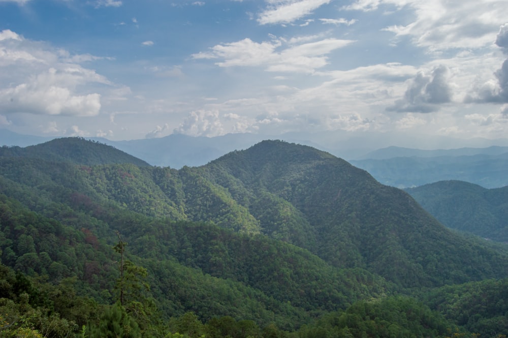 green mountains under blue sky during daytime