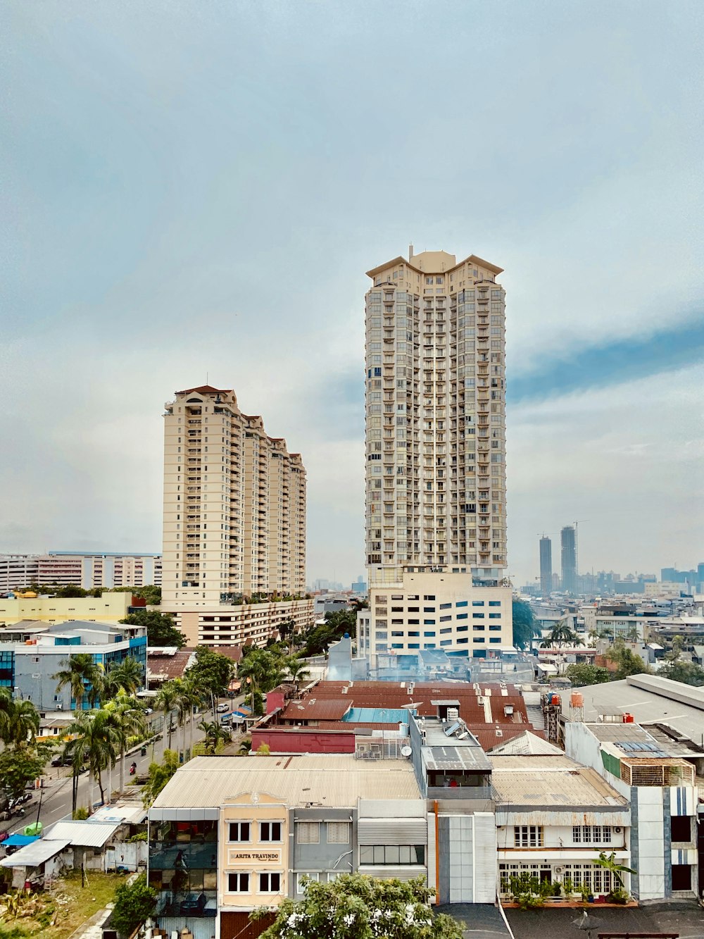 white and brown concrete building during daytime