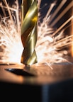 a drill going against a durable metal or steel sign 
