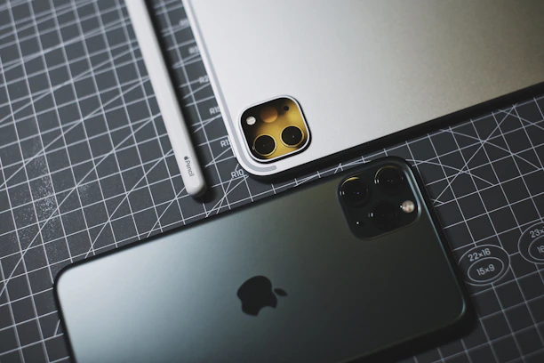 silver iphone 6s on silver macbook