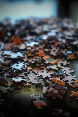 Close-up of puzzle pieces fitting together, showing vibrant colors and shapes.