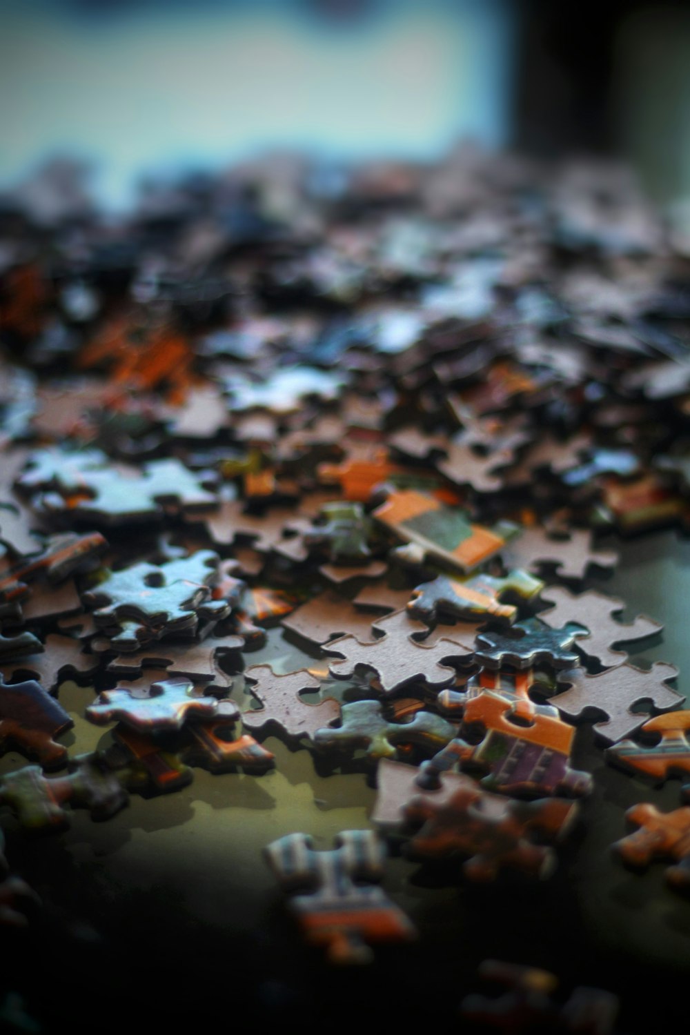 brown and black jigsaw puzzle