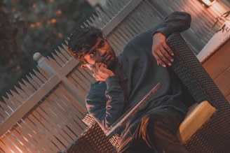 A friendly customer on the phone sharing details about old furniture