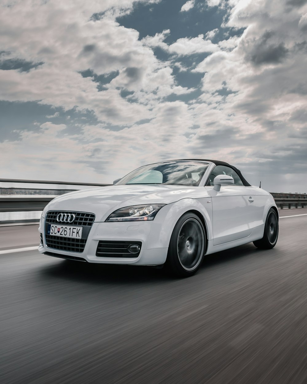 white audi r 8 on road during daytime