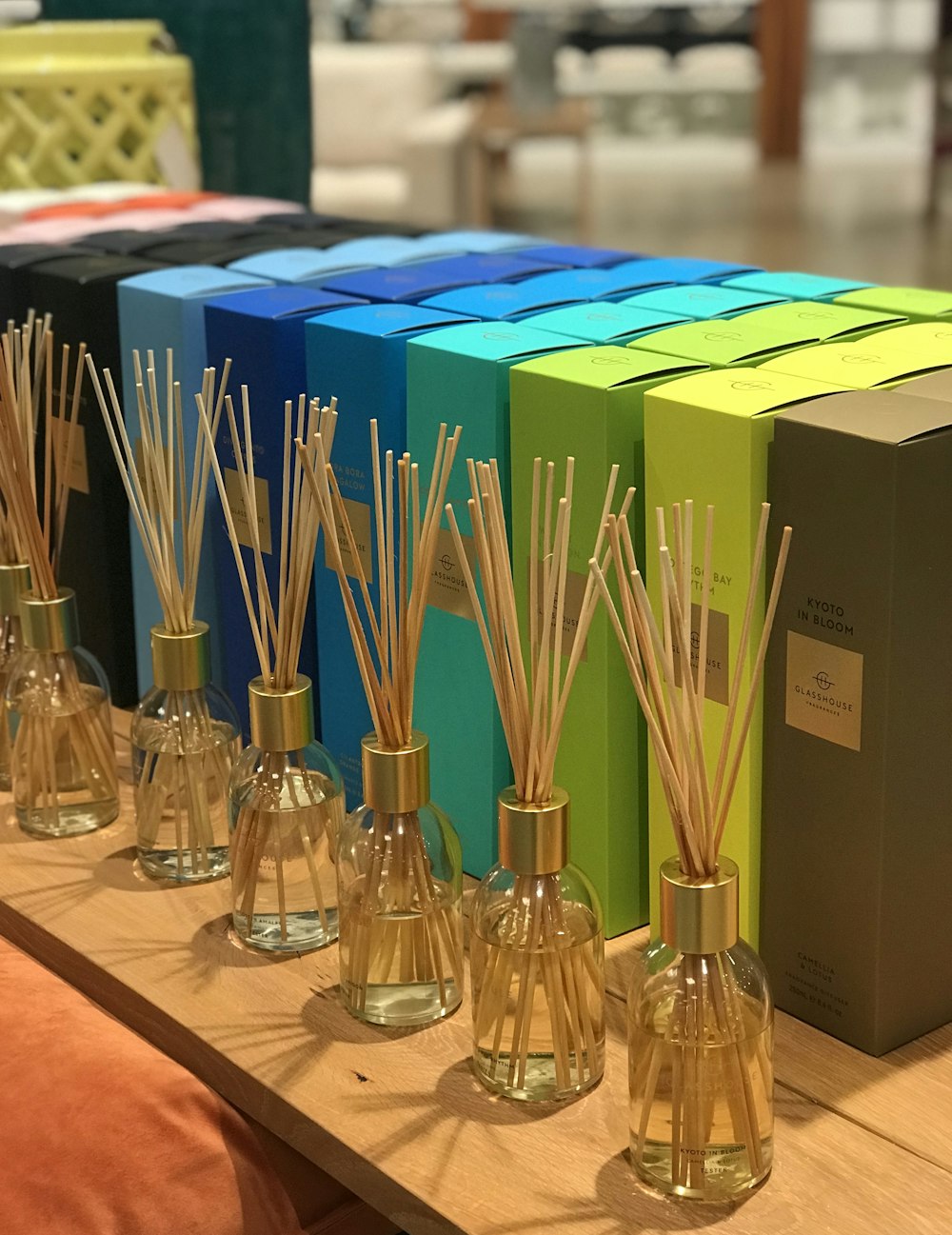 clear glass bottles on brown wooden table