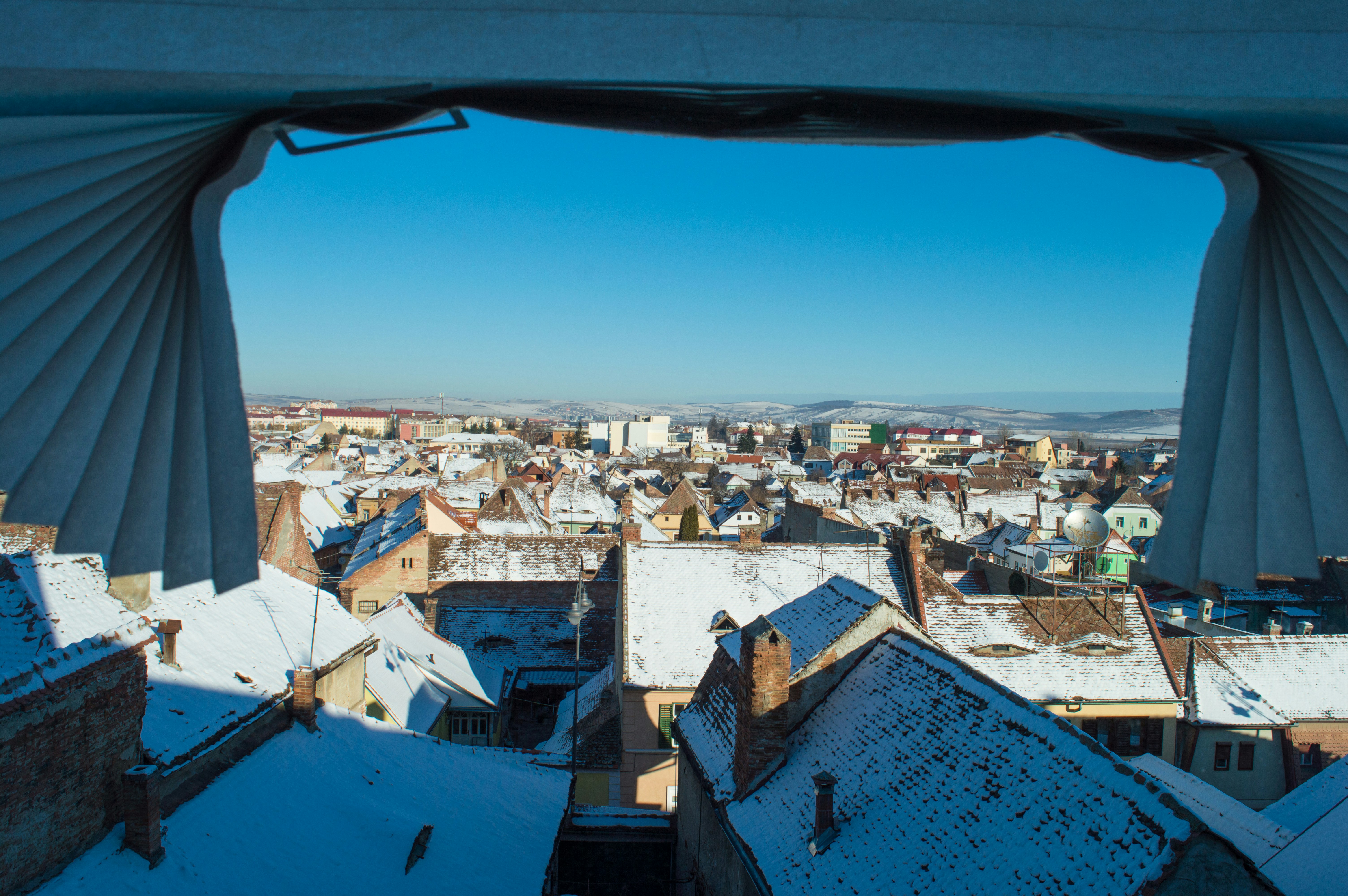 white and brown houses under blue sky during daytime