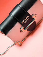 black and brown michael kors leather sling bag