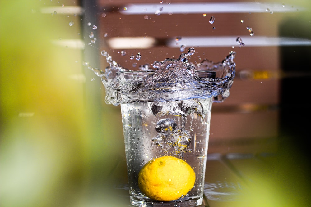 water splash on yellow lemon
