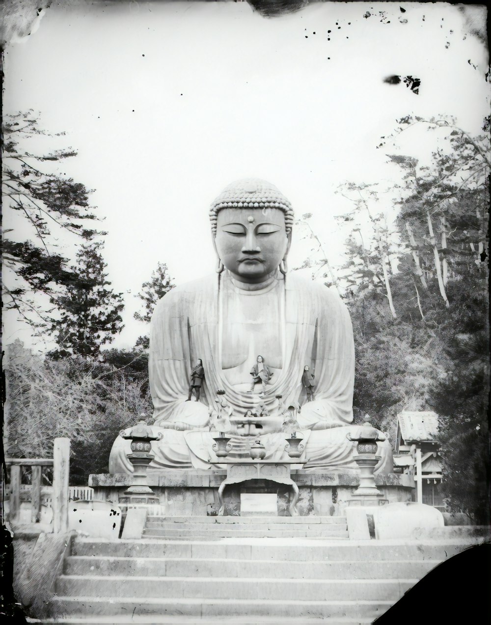 gray scale photo of buddha statue