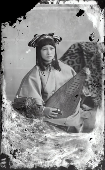 Portrait of Pandit Srinivas Bhatt in traditional attire, surrounded by astrological charts and sacred texts.