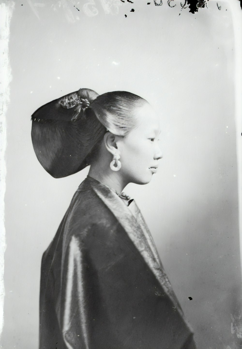 grayscale photo of woman wearing black hat