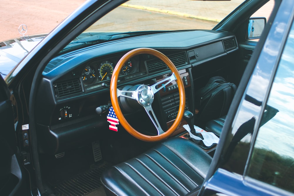 black and brown car steering wheel