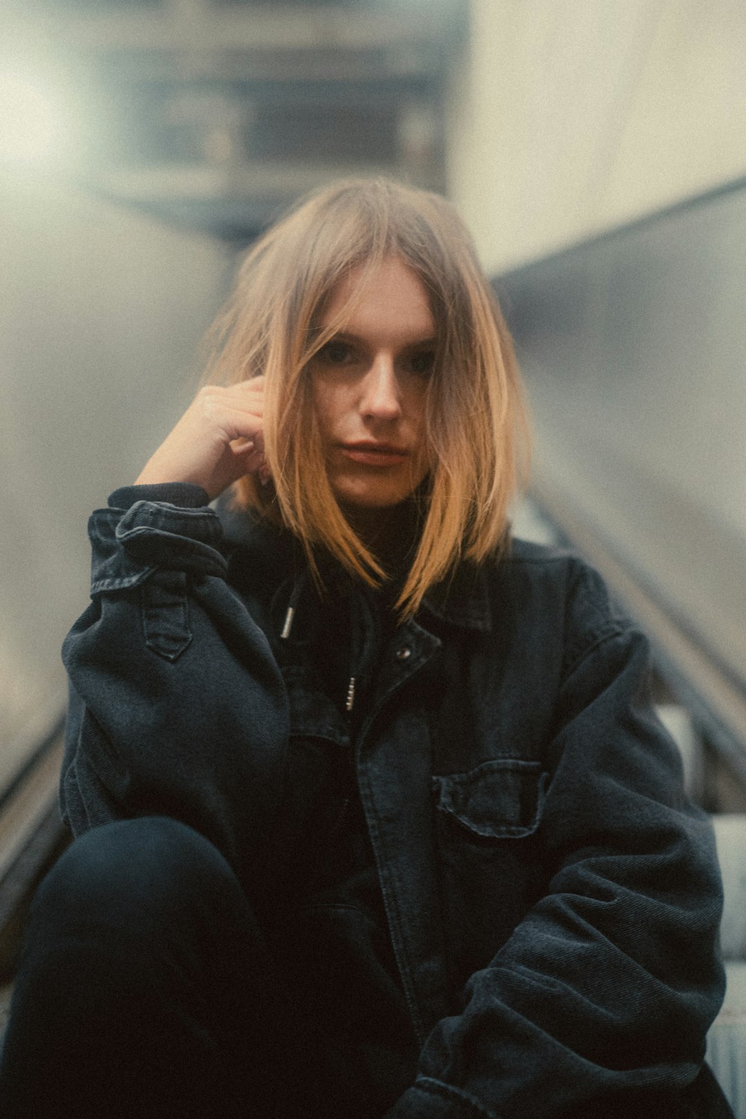 woman in black denim jacket