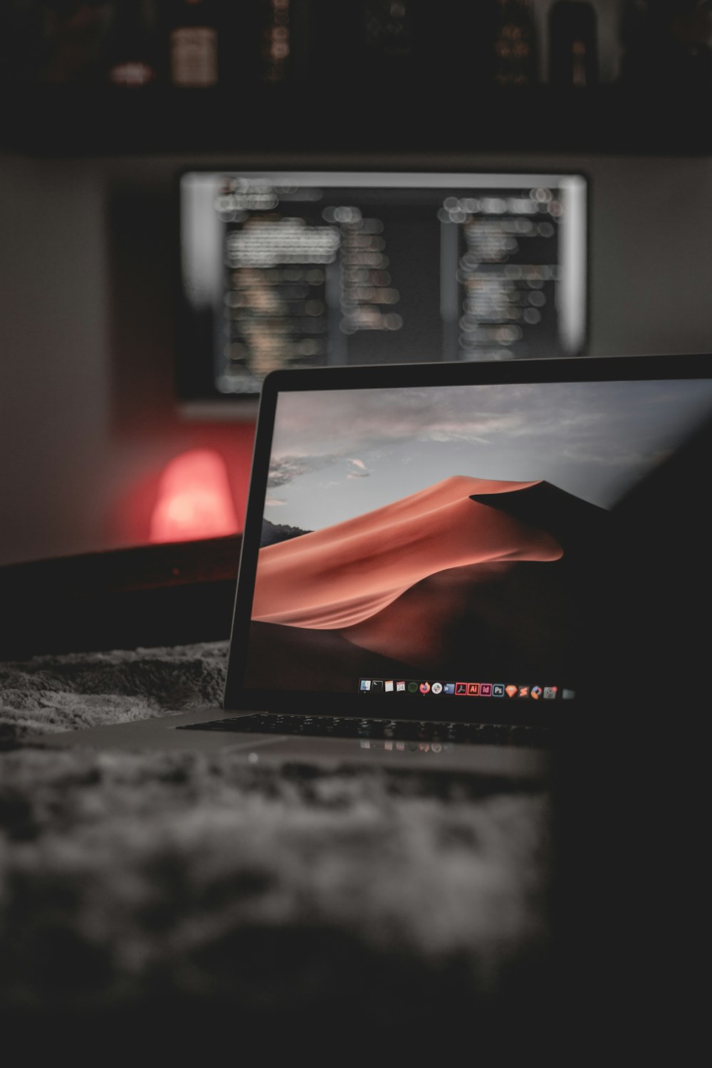 black laptop computer on brown marble table