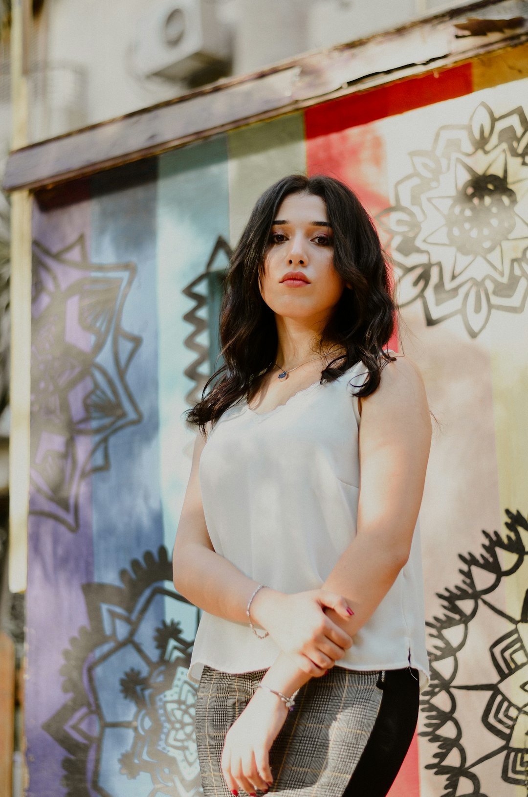 woman in white sleeveless dress