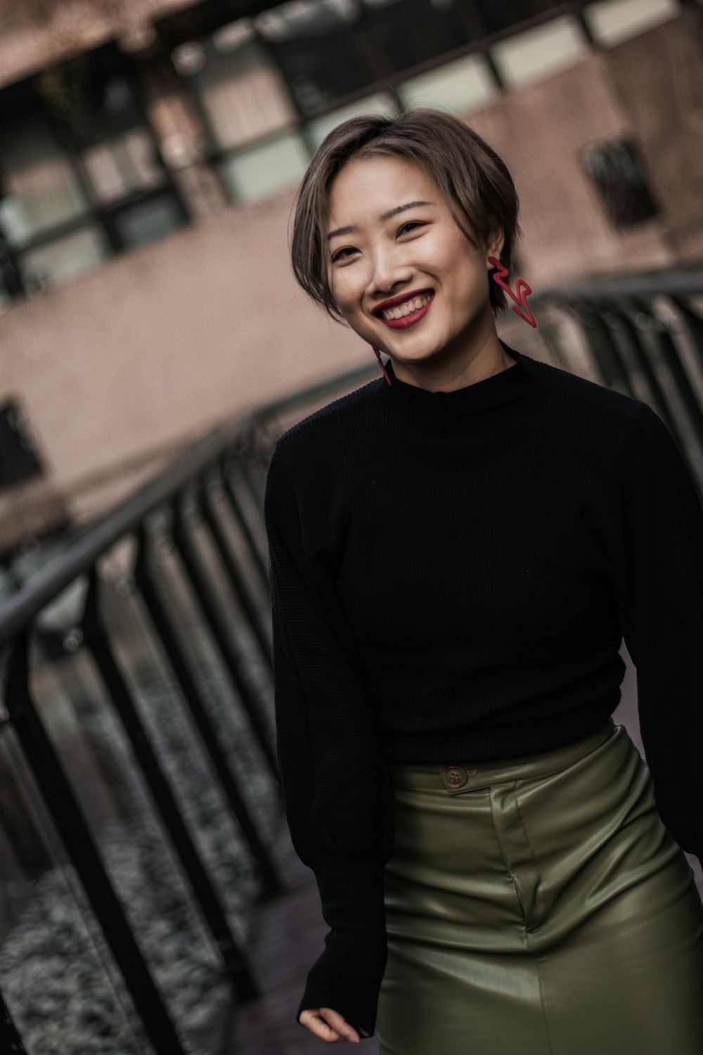 woman in black long sleeve shirt and brown denim bottoms