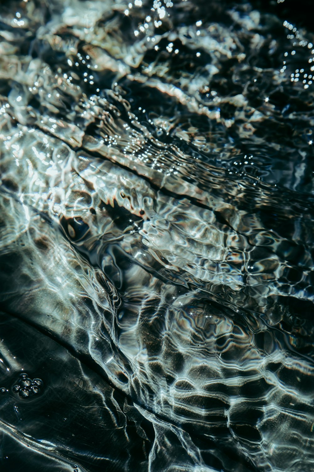 water drops on body of water