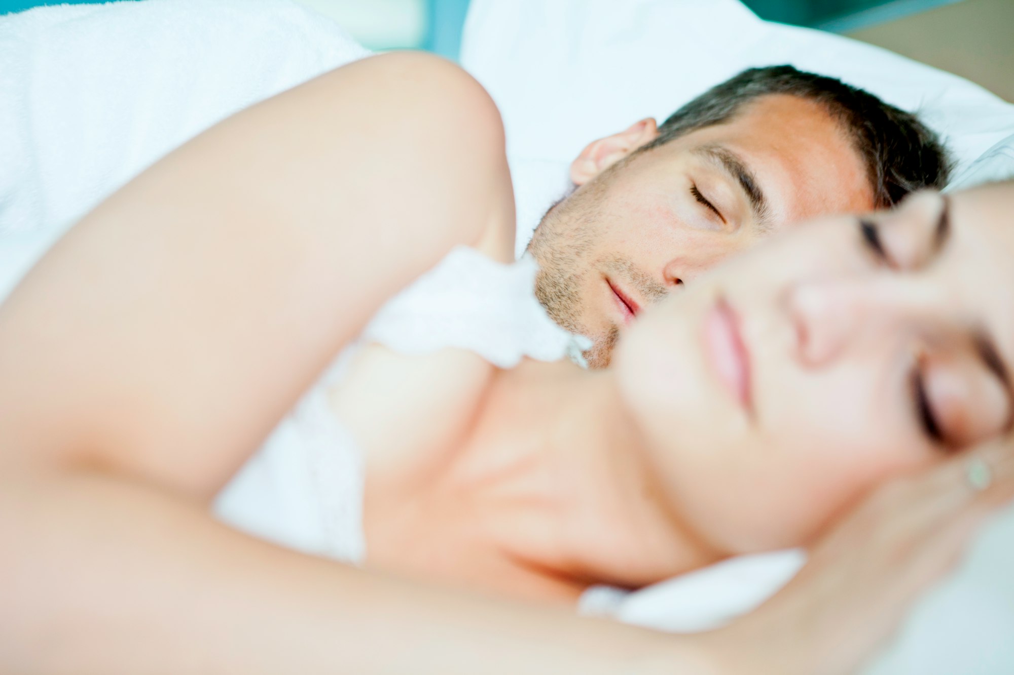 Sleeping together on white bedsheets, taking melatonin while breastfeeding