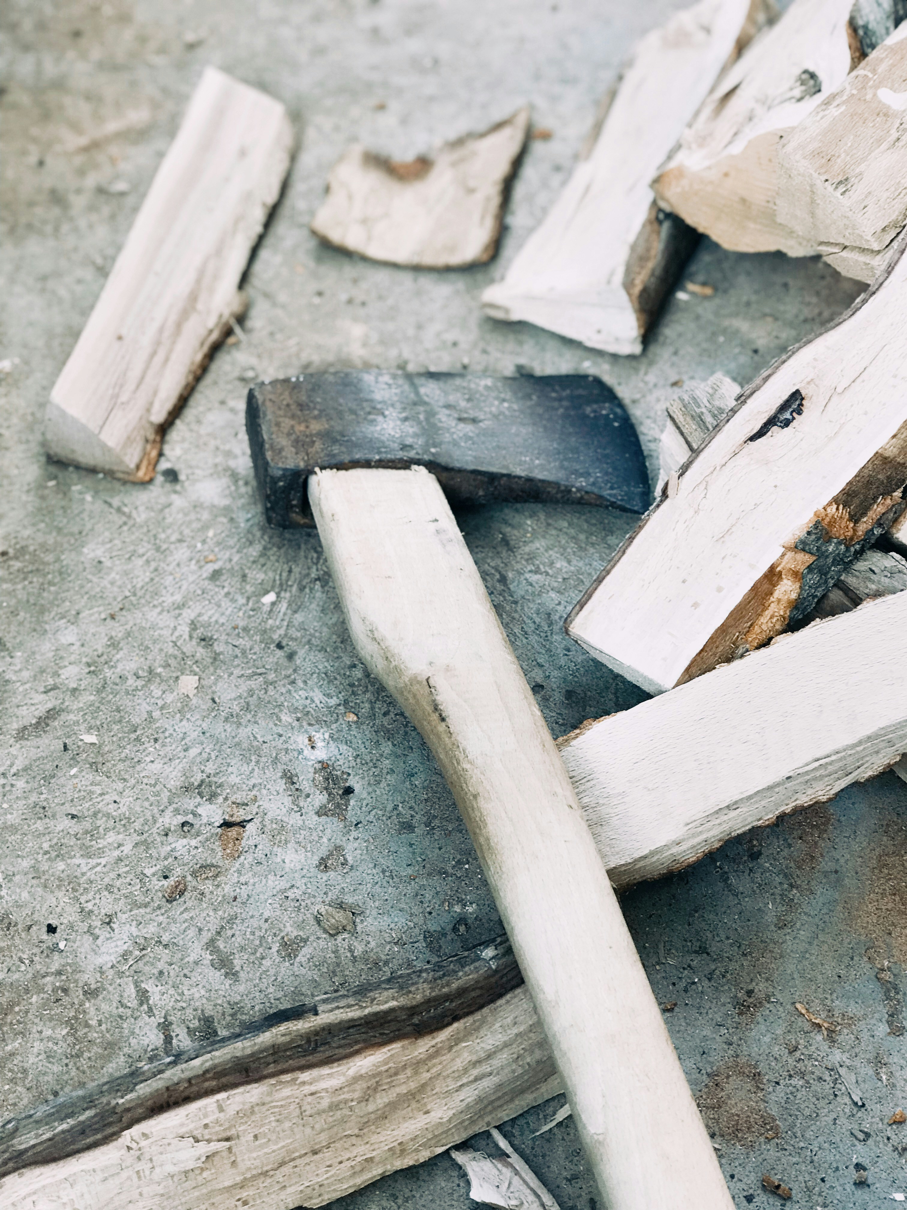 brown wooden stick on gray concrete floor