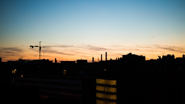 silhouette of building during sunset