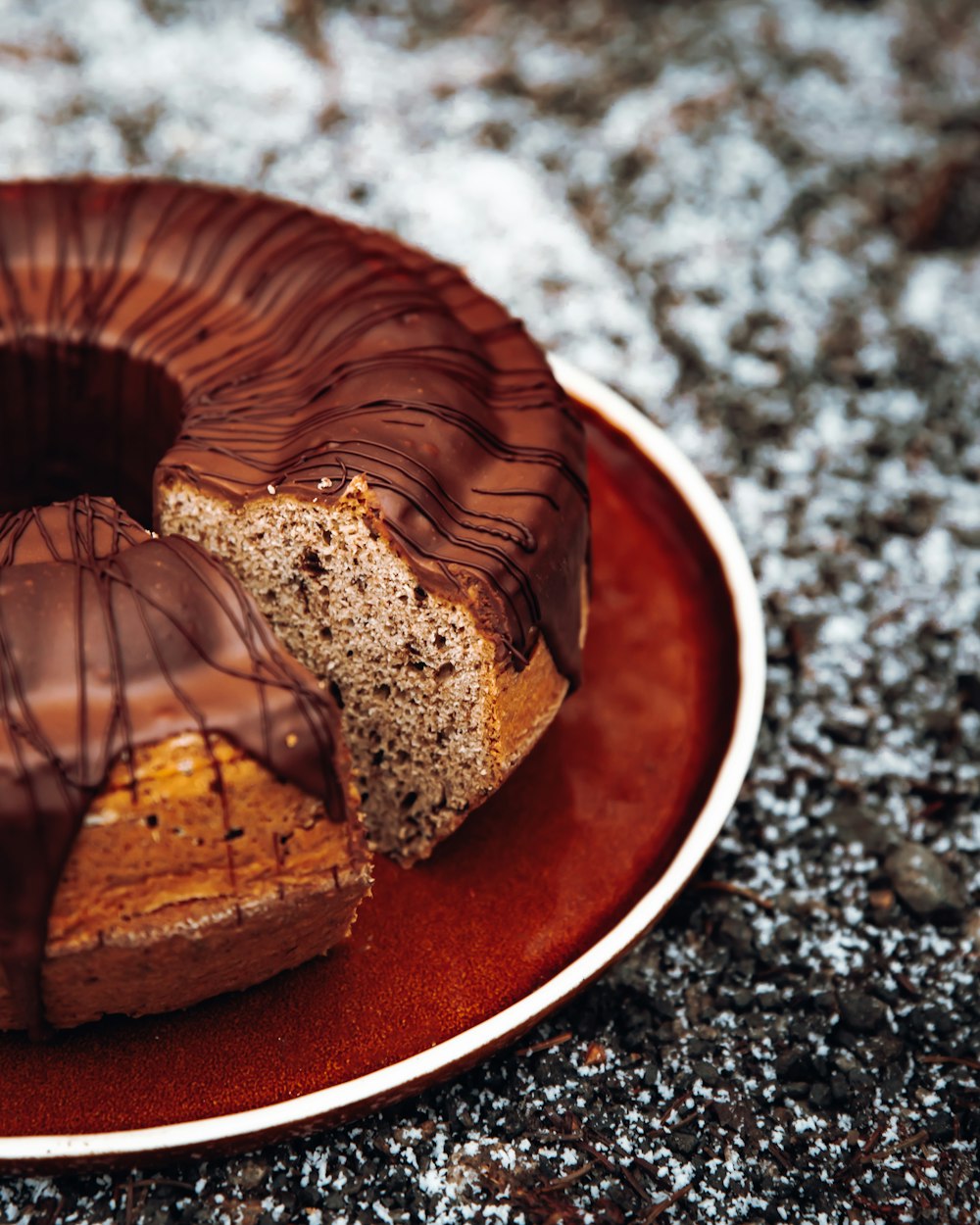 chocolate cake on white ceramic plate