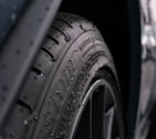 black and gray wheel with tire