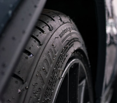 black and gray wheel with tire
