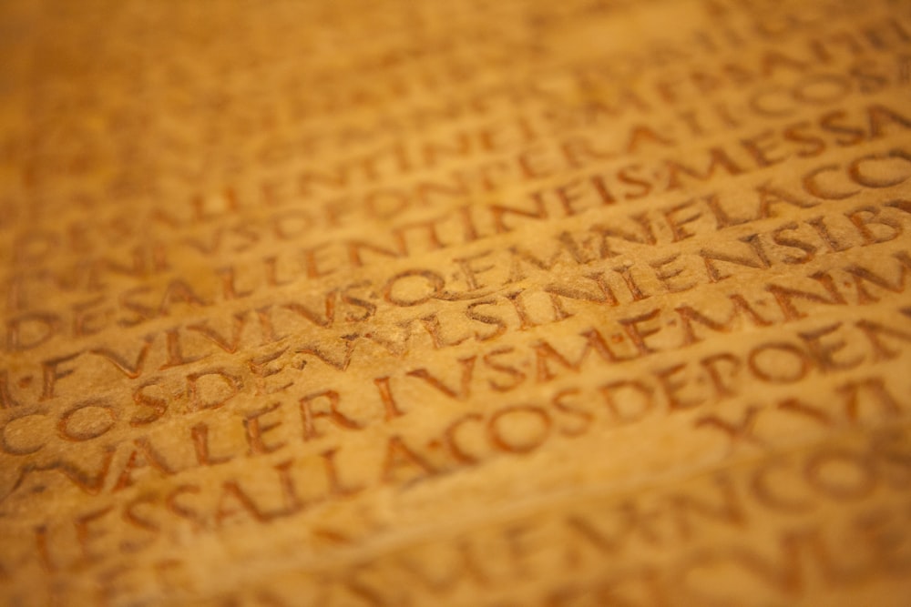 text on brown wooden surface