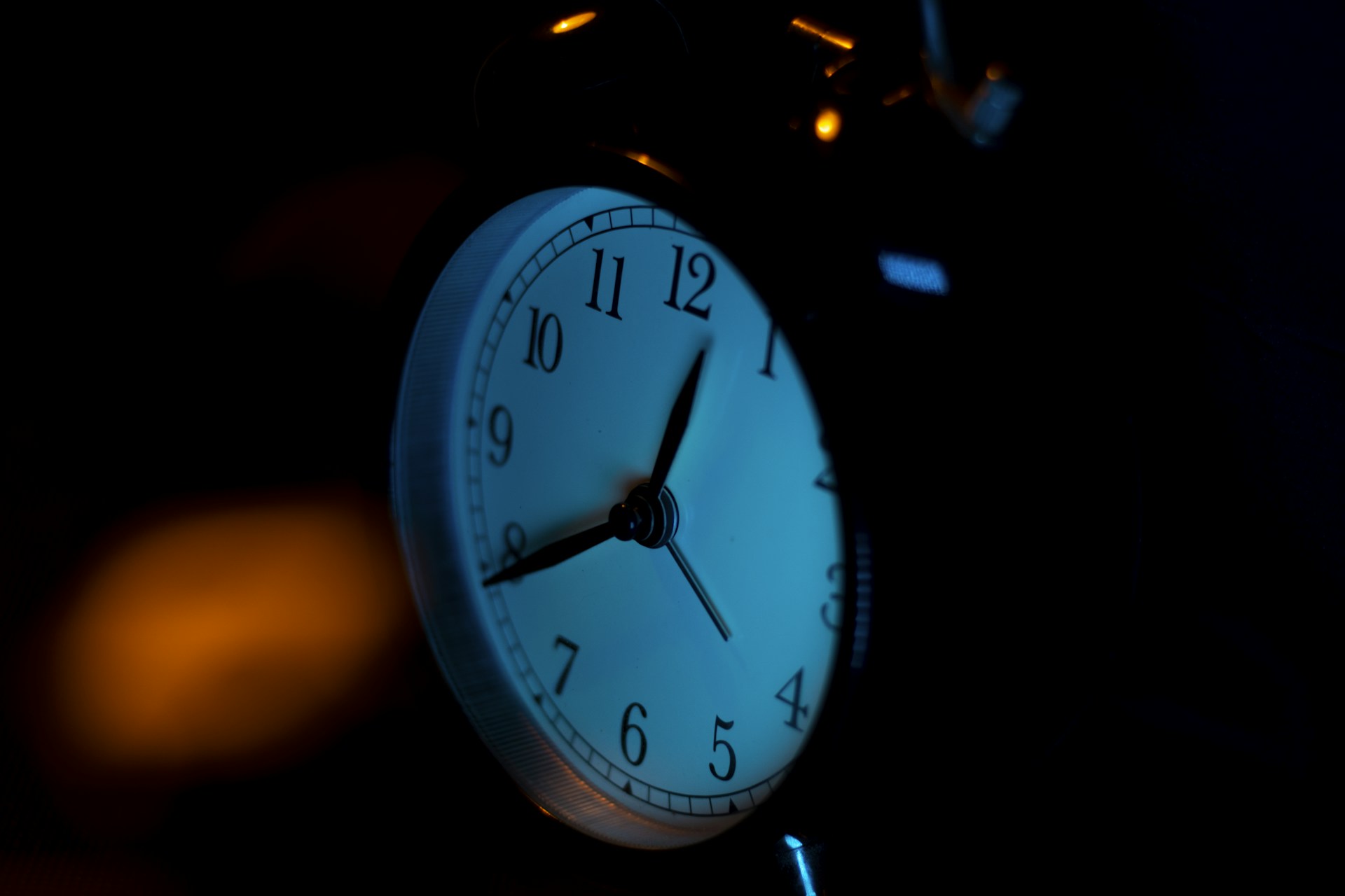 white and silver alarm clock