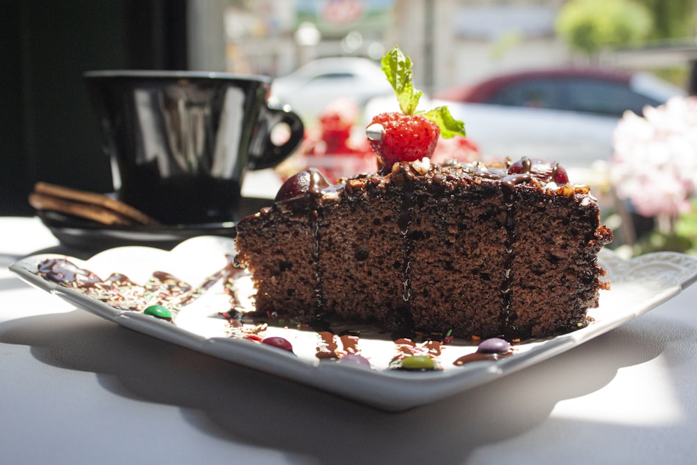 chocolate cake on white ceramic plate