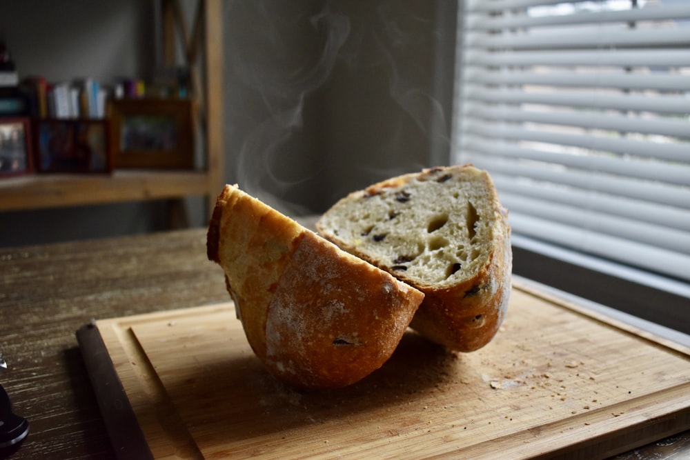 bread on brown wooden chopping board