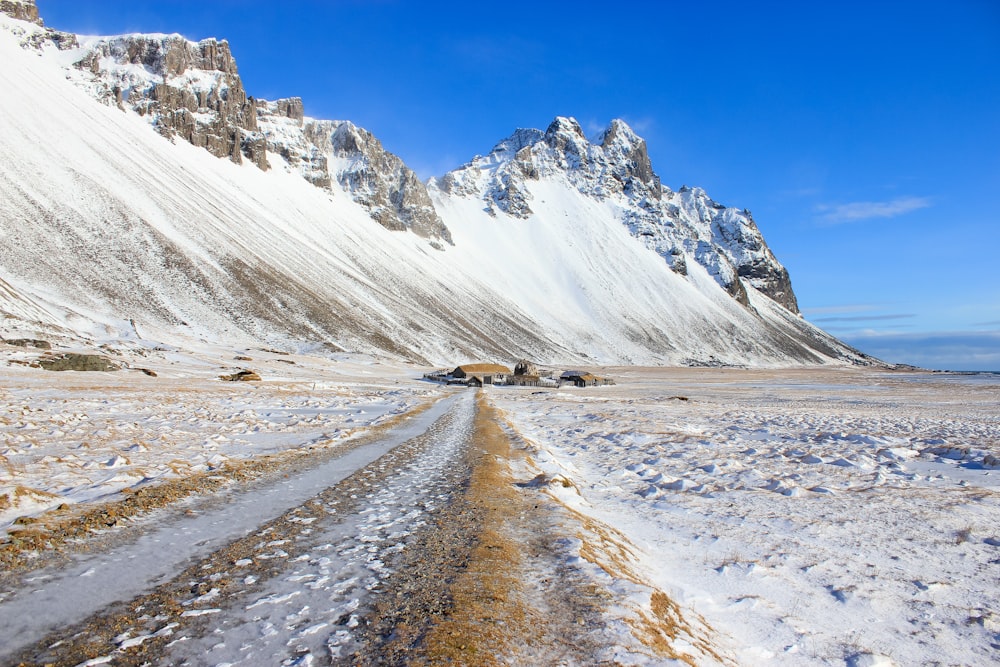 snow covered mountain under blue sky during daytime