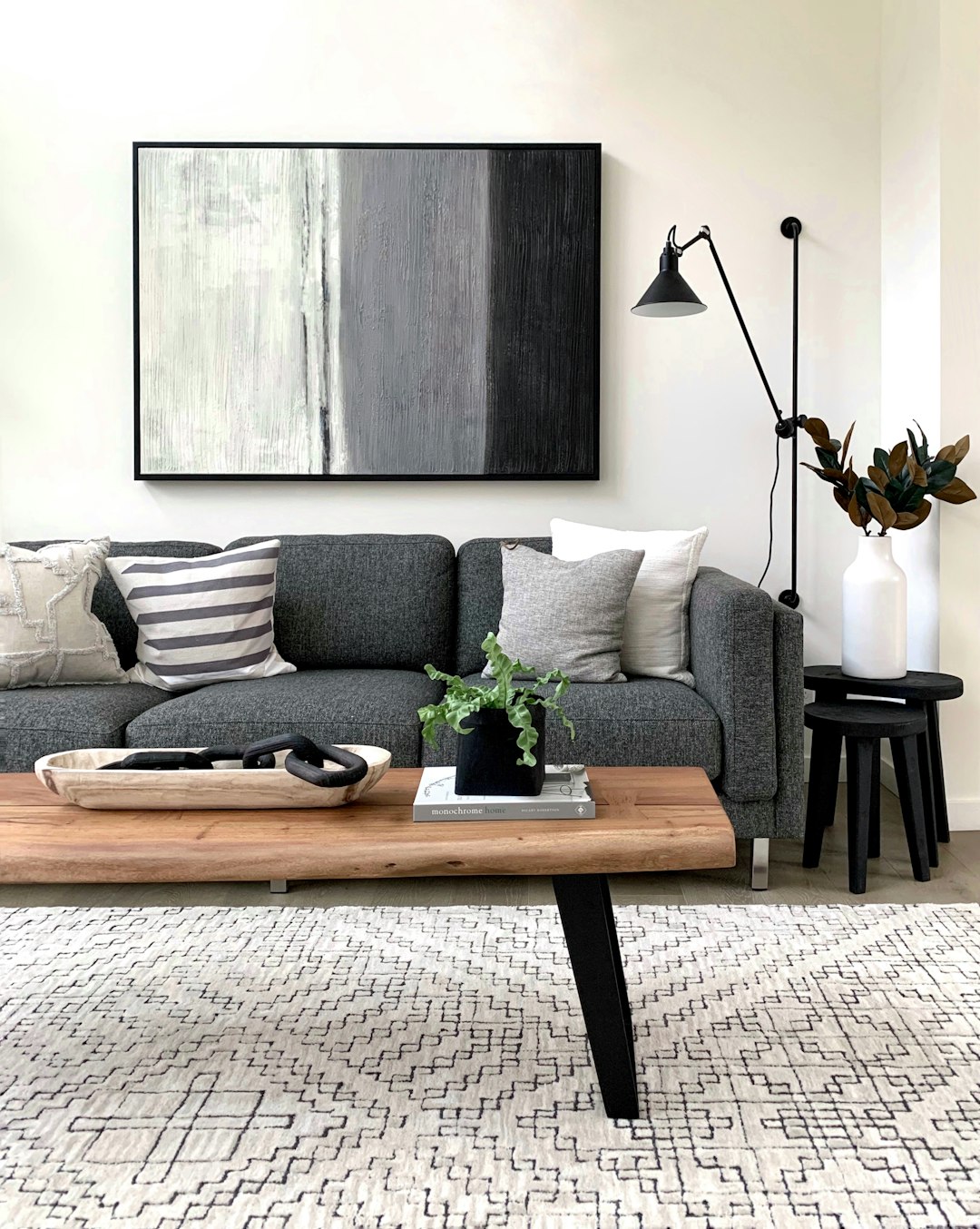  black and white throw pillows on gray couch couch