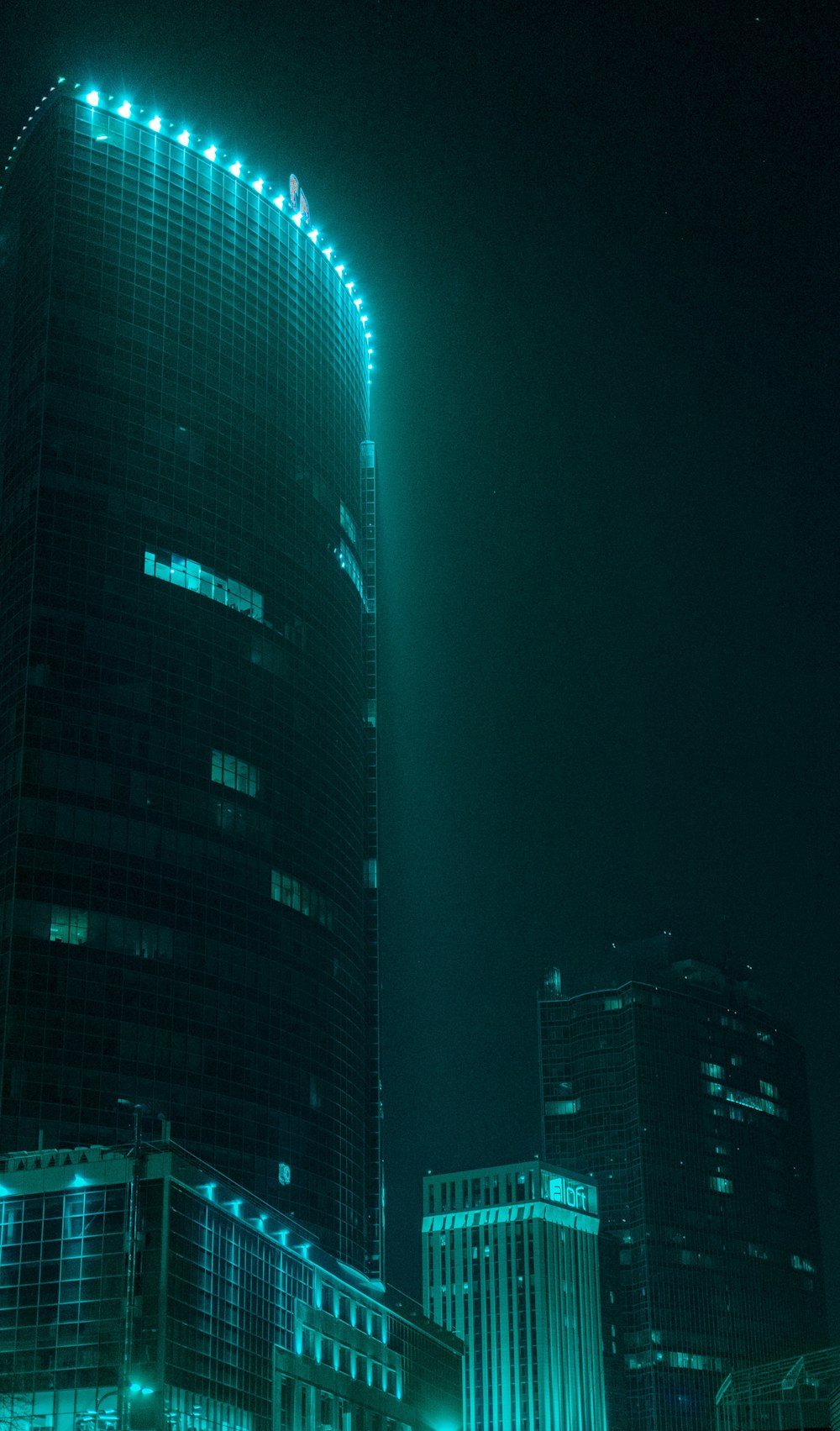 black and blue high rise building during night time