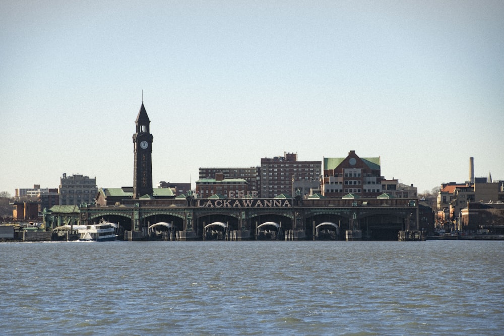 brown concrete building near body of water during daytime