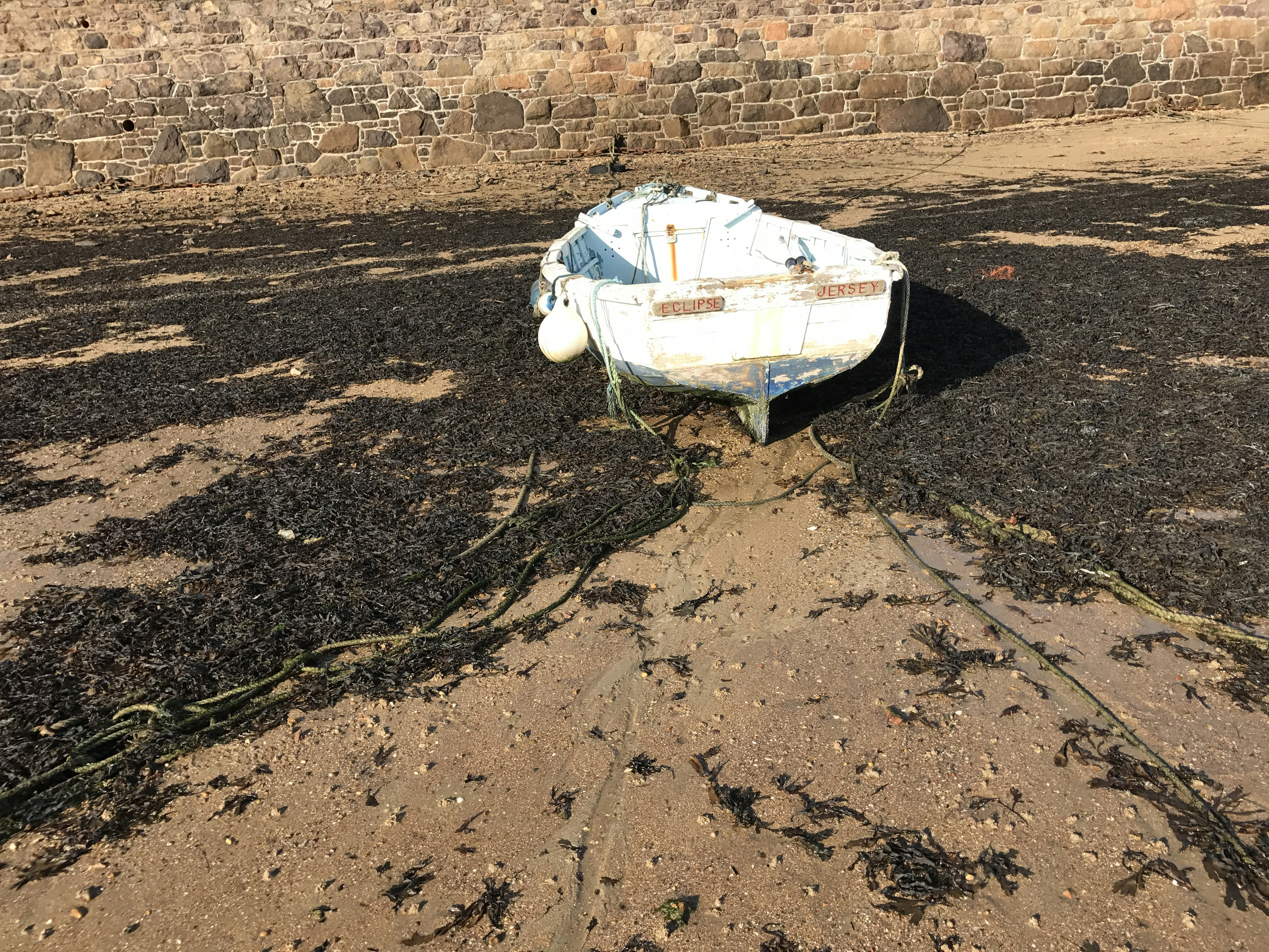 white car covered with mud