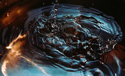 water drops on body of water