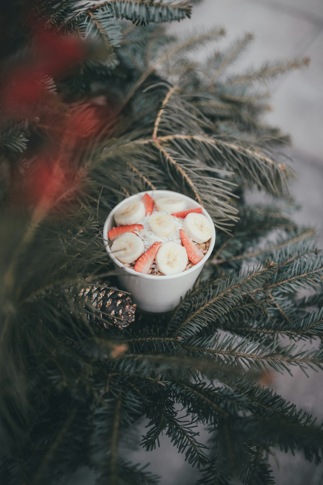 white ceramic cup with red and white liquid inside