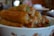 A satisfied customer using Jada Bake's commercial spring roll machine in their kitchen.