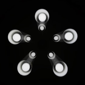 Elegant orbital paths around a central star representing interconnected brand ecosystems in deep space.