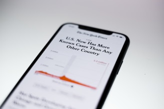 black android smartphone on white table