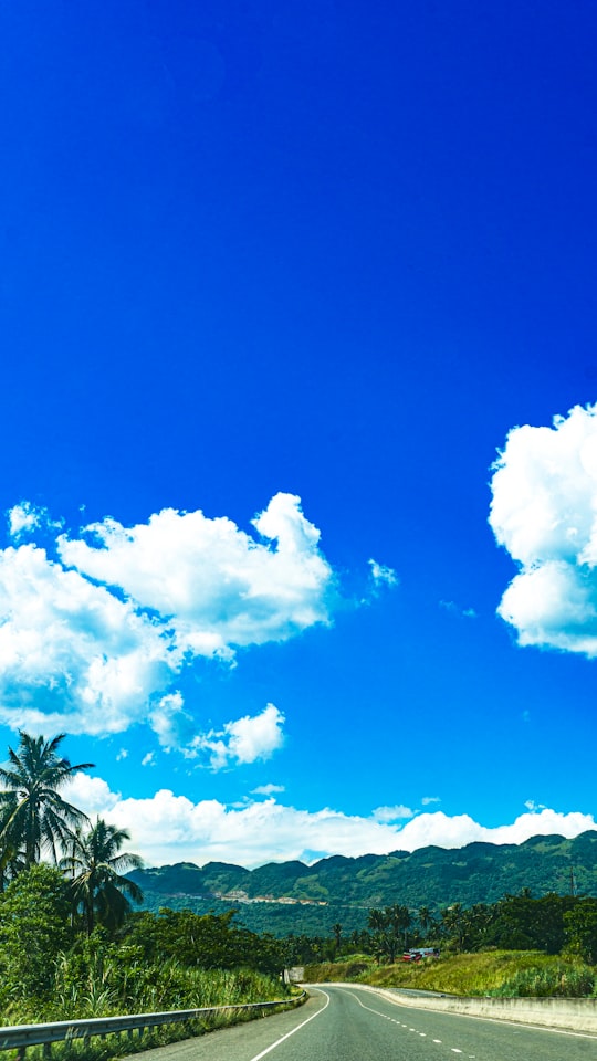 white clouds and blue sky during daytime in Kingston Jamaica