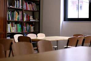 A quiet home environment with books and notes spread out for a personalized lesson.