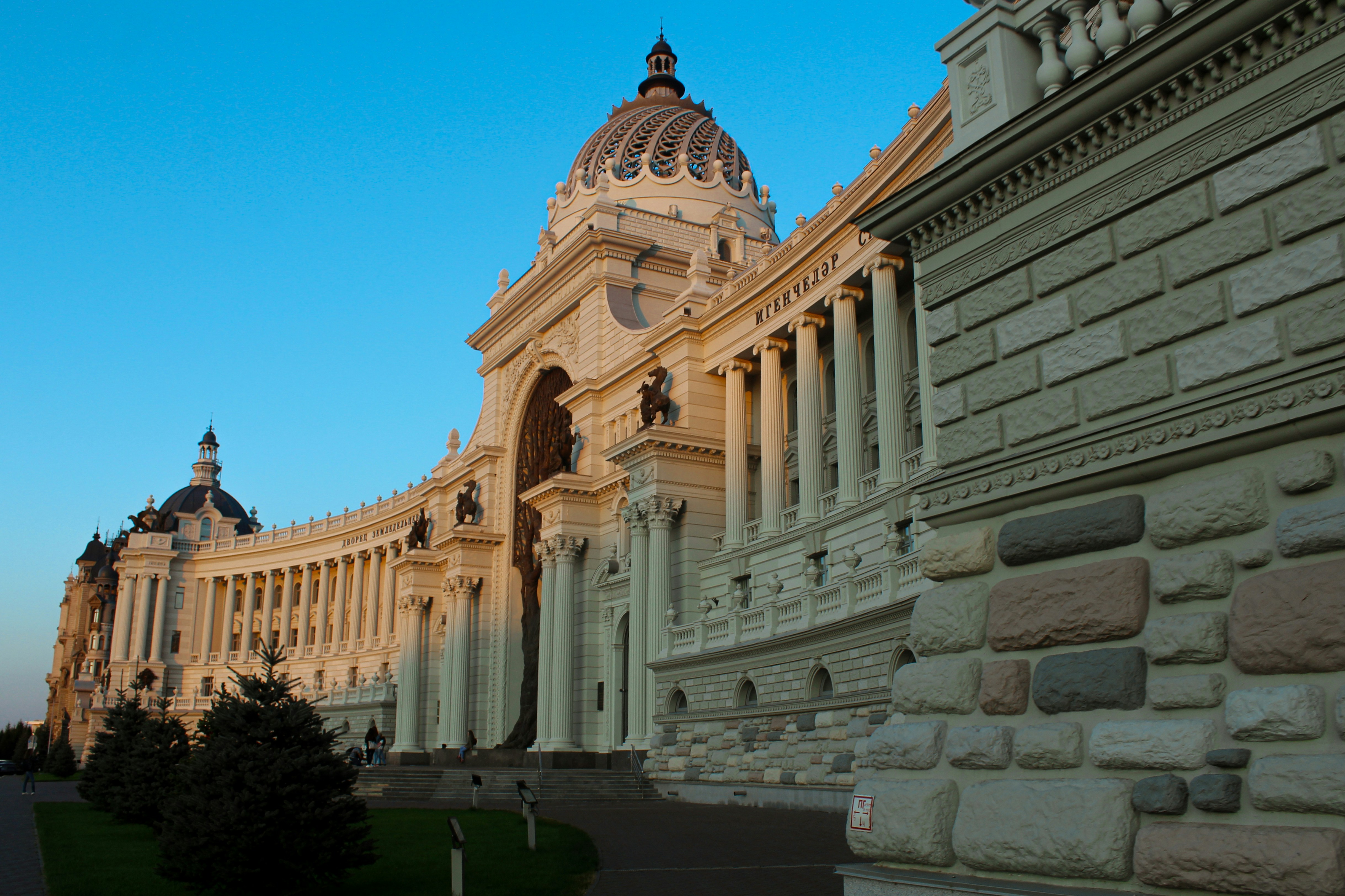 white concrete building under blue sky during daytime