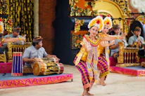 Students engaging actively in a traditional Balinese cultural dance class.