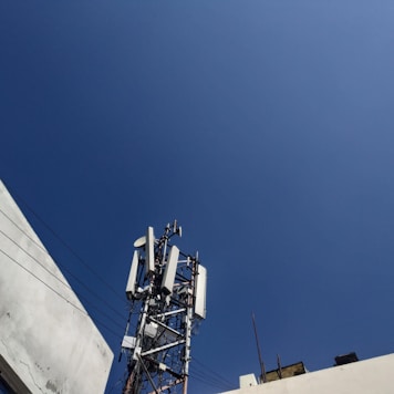 Modern telecommunications equipment setup with blue corporate tones.