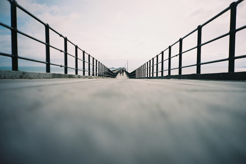 grayscale photo of a bridge